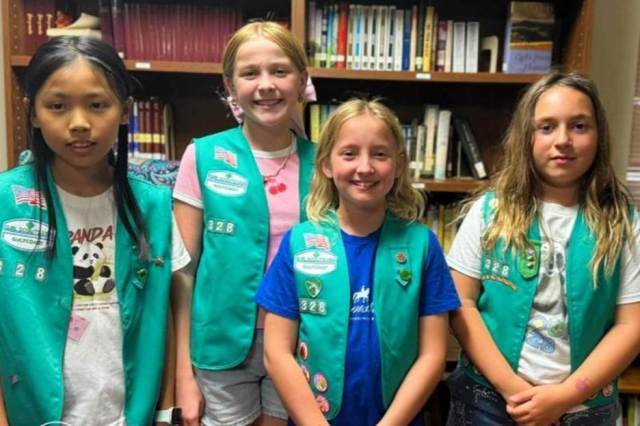 Girls Scouts Mary, Juliana, Lizzy and Alisa from Troop 328 earned the Girl Scout Bronze Award by advocating for animal welfare and creating a garden space at Shy Wolf Sanctuary.