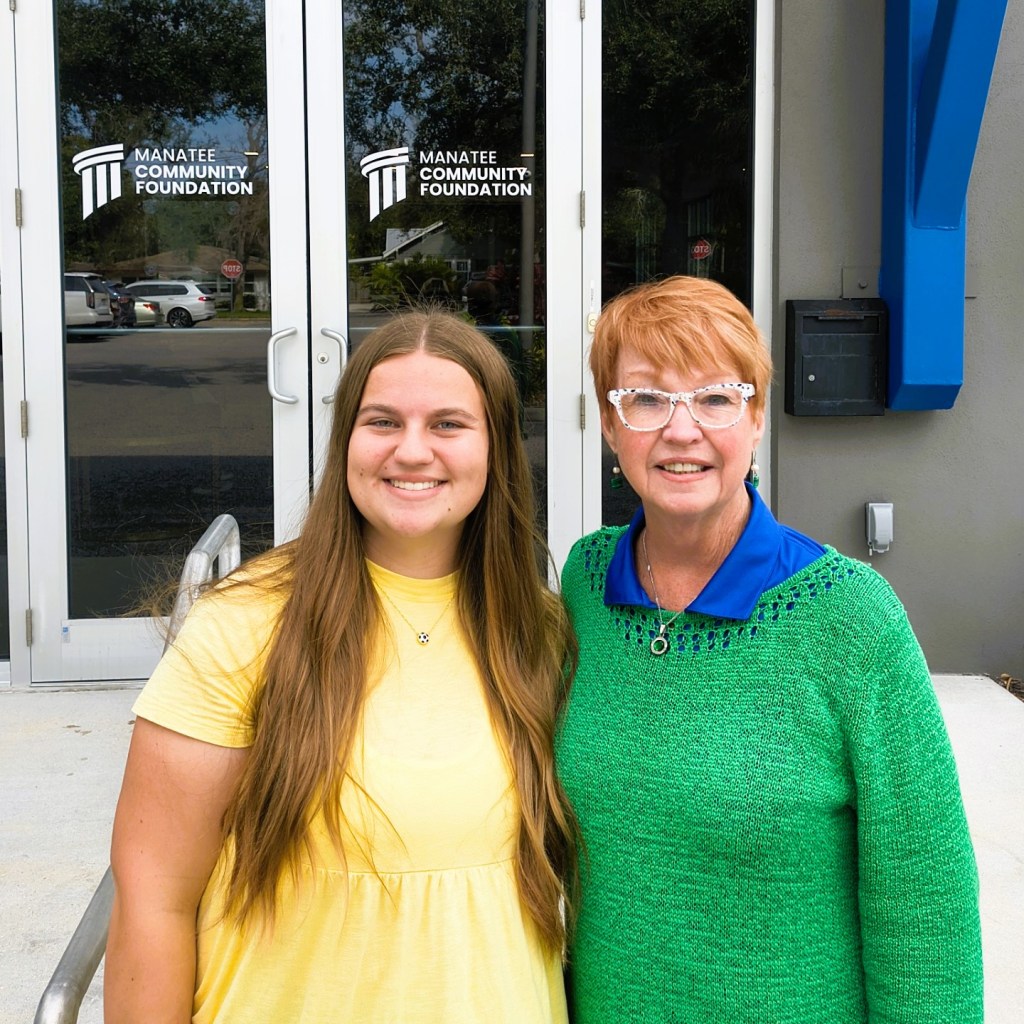 Girl Scout Zoe L. and Girl Scouts of Gulfcoast Florida CEO Mary Anne Servian wrap up filming at the Manatee Community Foundation for the 2026 Spirit of Manatee award video.