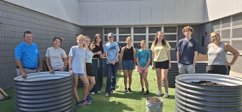 Corrin Zurbrigg of Girl Scouts of Gulfcoast Florida completed her Girl Scout Gold Award project by leading volunteers to build an accessible garden at Barron Collier High School that provides hands-on learning opportunities for students in the Exceptional Student Education program.