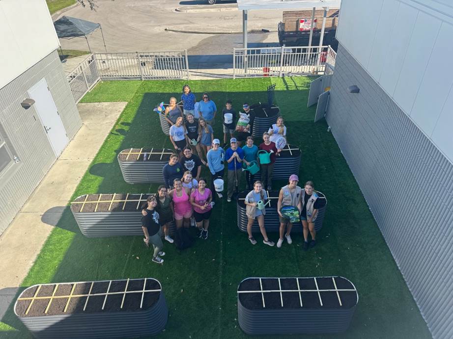 Corrin Zurbrigg of Girl Scouts of Gulfcoast Florida completed her Girl Scout Gold Award project by leading volunteers to build an accessible garden at Barron Collier High School that provides hands-on learning opportunities for students in the Exceptional Student Education program.