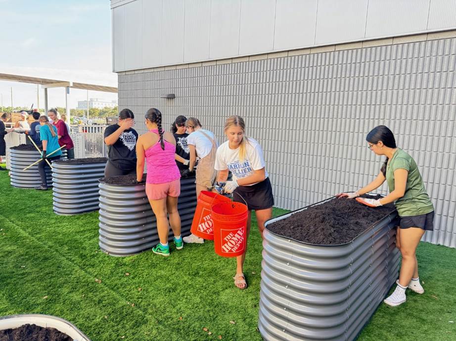 Corrin Zurbrigg of Girl Scouts of Gulfcoast Florida completed her Girl Scout Gold Award project by leading volunteers to build an accessible garden at Barron Collier High School that provides hands-on learning opportunities for students in the Exceptional Student Education program.