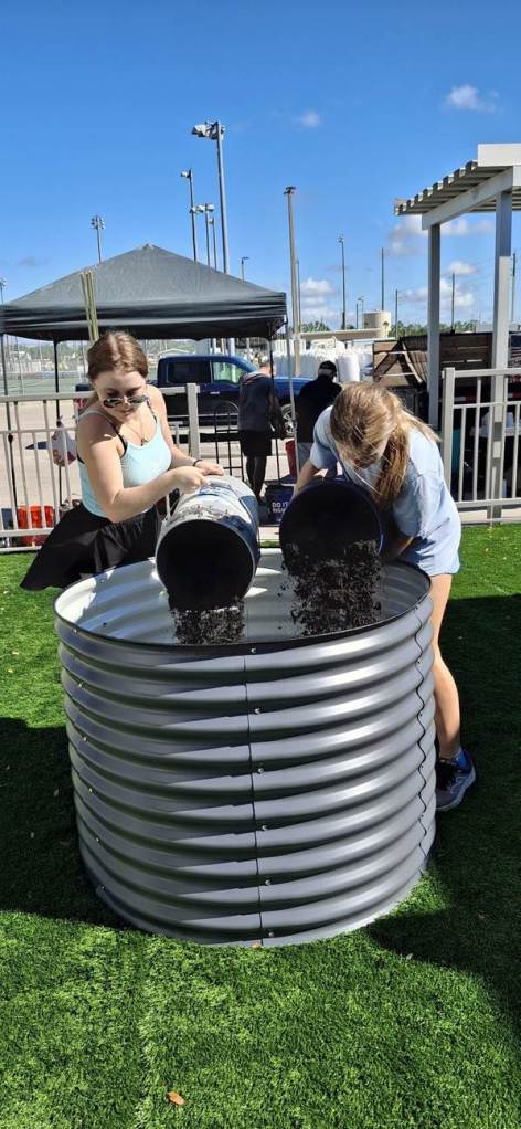 Corrin Zurbrigg of Girl Scouts of Gulfcoast Florida completed her Girl Scout Gold Award project by leading volunteers to build an accessible garden at Barron Collier High School that provides hands-on learning opportunities for students in the Exceptional Student Education program.
