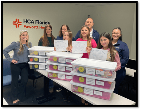 Girl Scouts of Gulfcoast Florida Earn Highest Award for Bringing Comfort to Kids in Medical Crisis Sarasota & Charlotte County, FL – Three dedicated Girl Scout Cadettes from Troop 608 have earned the prestigious Girl Scout Silver Award—the highest award a Girl Scout Cadette can achieve—for creating and delivering sensory kits to children experiencing medical emergencies across Charlotte and South Sarasota Counties. Addison B., Emma V., and Brinley E. identified a critical gap in care: while sensory kits were available in shelters, EMS units, and hospital emergency rooms through the Southwest Florida Healthcare Coalition, they were not available in local free-standing emergency departments or walk-in clinics—facilities where many families first seek care. Their Take Action project, “Sensory Kits for Kids in Distress,” provided nine fully stocked sensory kits to three free-standing departments and six walk-in clinics serving their community in Sarasota and Manatee County.